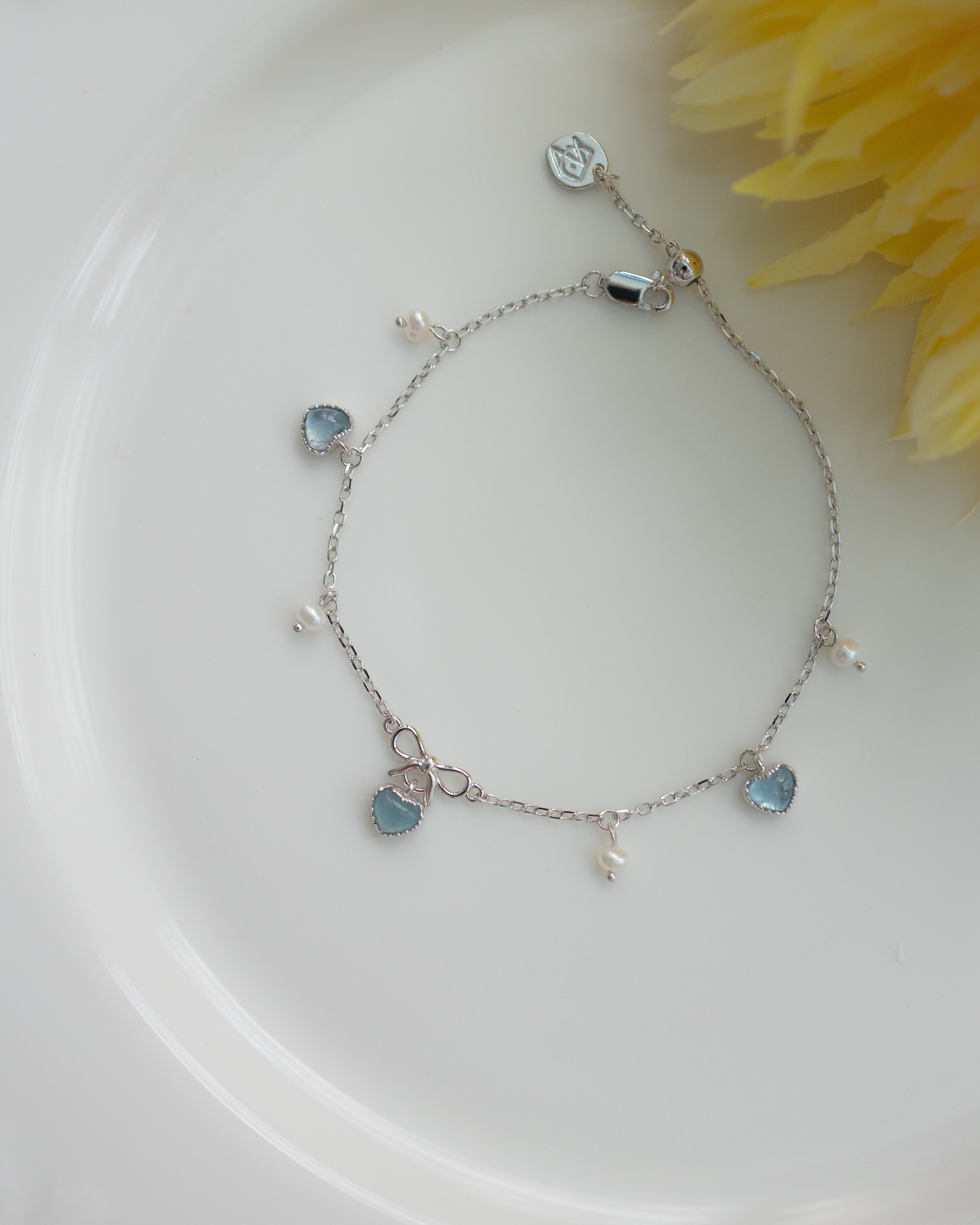 PRE ORDER SWEETHEART RIBBON SILVER BRACELET - AQUAMARINE