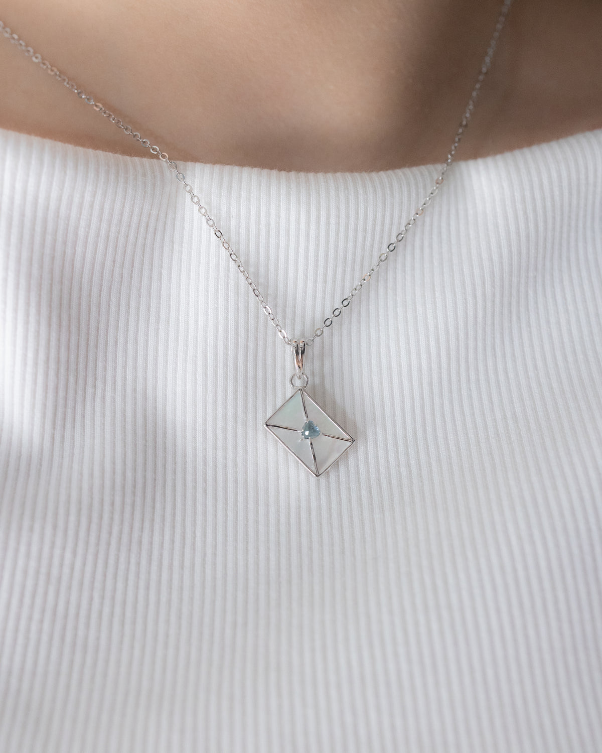 WROTE ME A LOVE LETTER SILVER NECKLACE - PEARL & TOPAZ