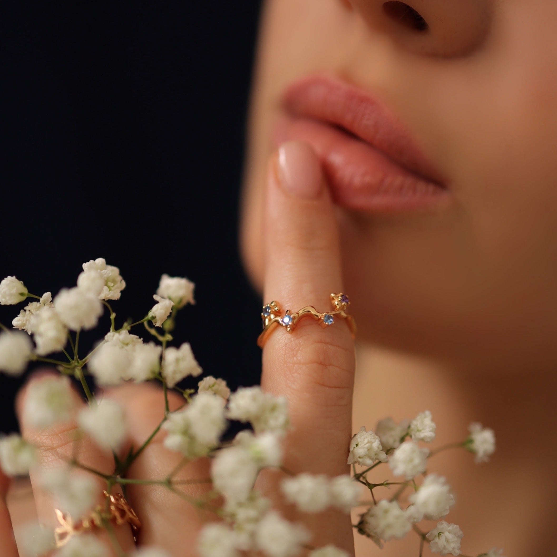 ABSTRACT FLOWING FLORA RING